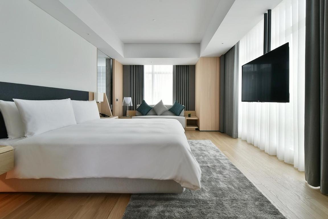 Silks Club Hotel Kaohsiung Exterior photo Deluxe Room